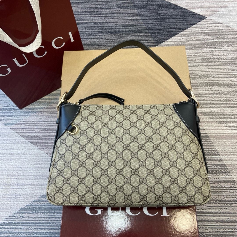 G*u*i top handle bags